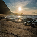 Golden sunlight reflection on sand beach